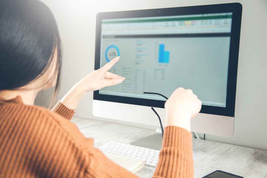 woman working graph computer screen